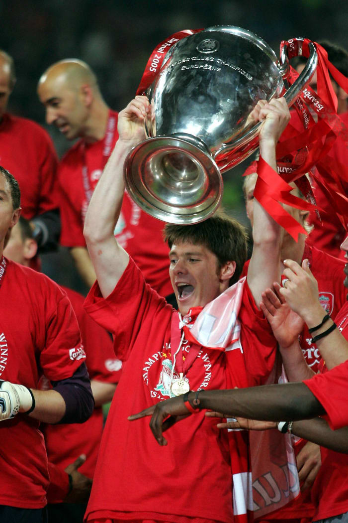 Xabi Alonso pictured lifting the UEFA Champions League trophy in May 2005 after Liverpool beat AC Milan in a famous final